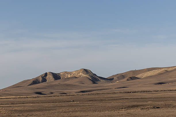 istock Majestic Desert Fortress: A Mountain Range Rises in Solitude 2225193172