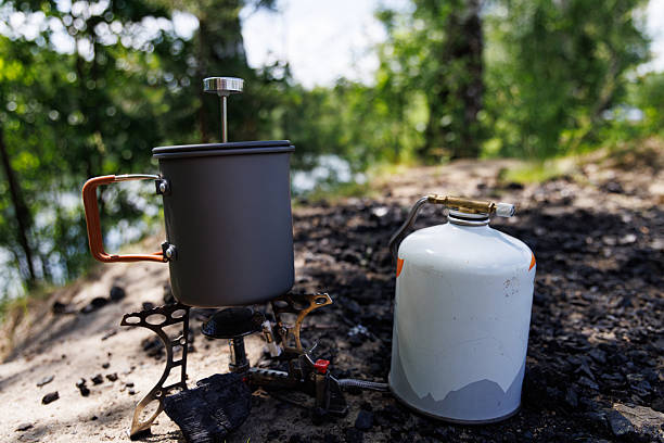istock Campfire coffee brewing adventure by the lake on a sunny afternoon 2225194863