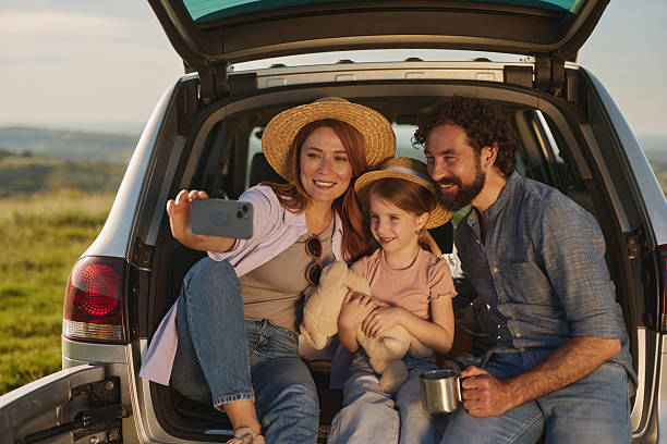 istock Family taking a selfie during a road trip picnic 2225194960