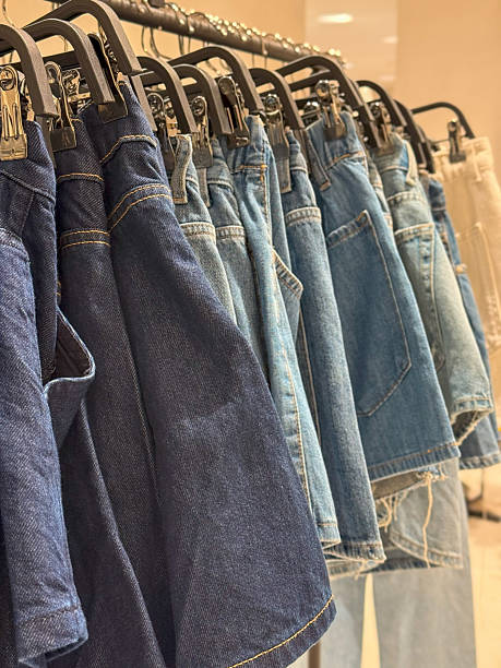 istock Denim Skirt Rack with Varying Washes and a Neutral Accent 2225196288
