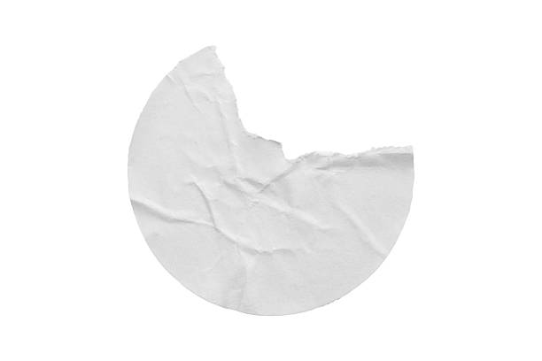 istock Blank white round torn paper sticker label isolated on white background 2225197942