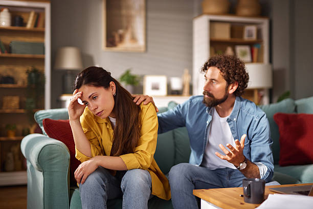 istock Young couple arguing about financial problems at home 2225198114