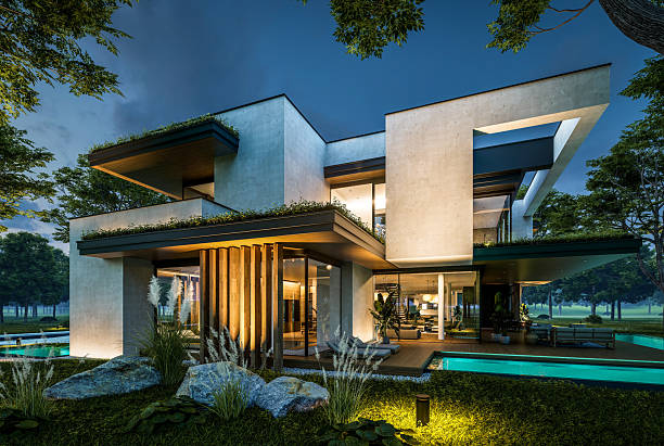 istock 3d rendering of two-story house with concrete facade in night 2225200568