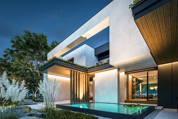 istock 3d rendering of two-story house with concrete facade in night 2225201214