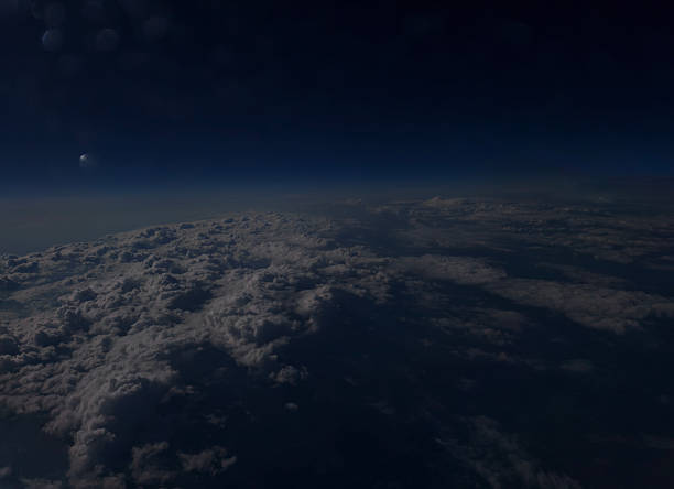 istock Beautiful space View of  Earth with Clouds Beneath a Serene Dark Sky and Horizon 2225201545