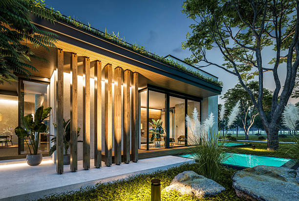 istock 3d rendering of two-story house with concrete facade in night 2225201558