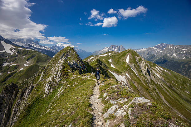 Amazing view on Monte Bianco mountains range with tourist on a foreground and incredible blue sky on background. French Alps, Chamonix, Landscape photography