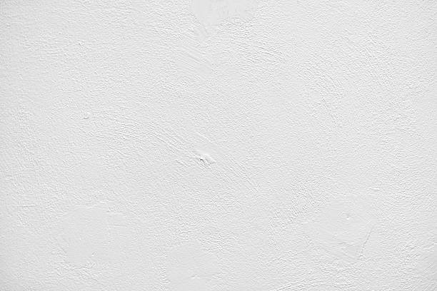 istock Textured grey concrete wall surface with details and imperfections visible 2225206861