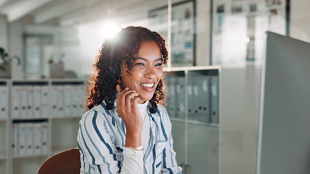 istock Computer, smile and woman with headset in call center for help or online assistance. Communication, contact us and customer service with employee for feedback or support as office virtual assistant 2225207063