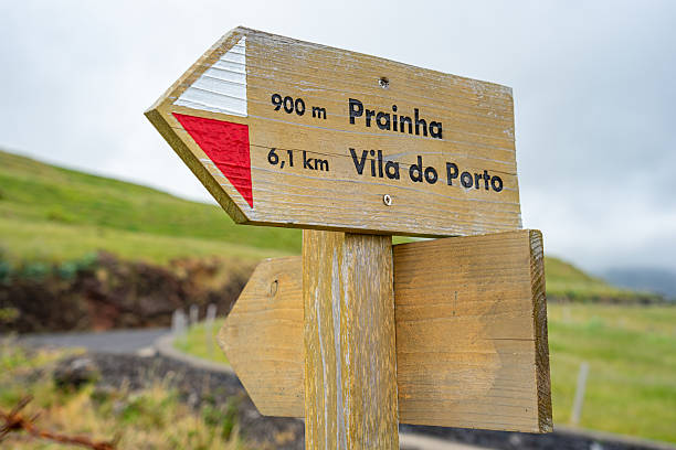 istock Direction arrows for pedestrian path to Vila do Porto on alternative path and Prainha. 2225211442
