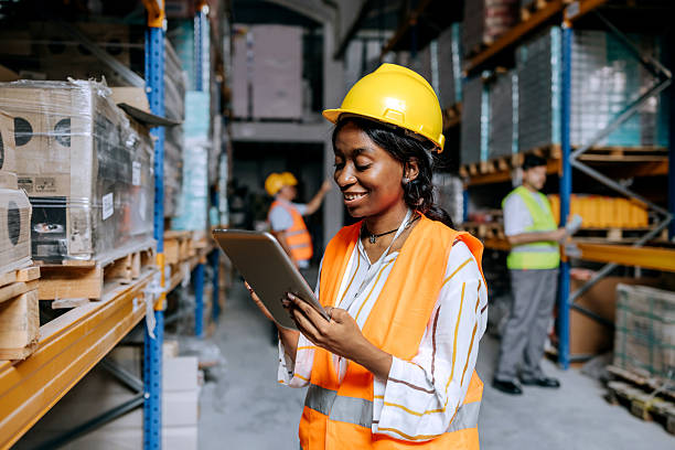 istock Young woman using the digital tablet in a warehouse 2225213318