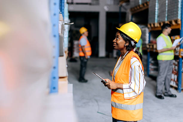 istock Young woman using the digital tablet in a warehouse 2225213707