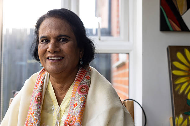 istock Smiling Senior Woman Relaxing at Home 2225213846