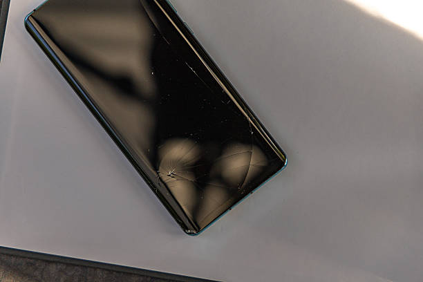istock Damaged mobile phone display, cracked phone digitizer, mobile phone repair 2225214916