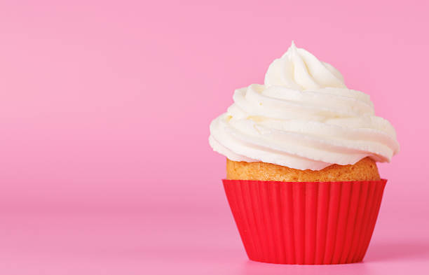istock Festive cupcake topped with swirled frosting 2225215654