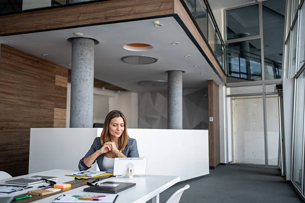 istock Businesswoman working on digital tablet in modern office 2225219695