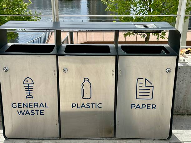 istock Metallic recycling bins in the park 2225221113