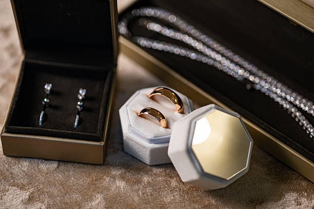 istock Wedding Rings and Jewelry Set on Soft Surface 2225223249