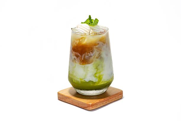 istock Ice matcha green tea mix Americano coffee serving on wooden plate, isolate and white background concept. 2225223805