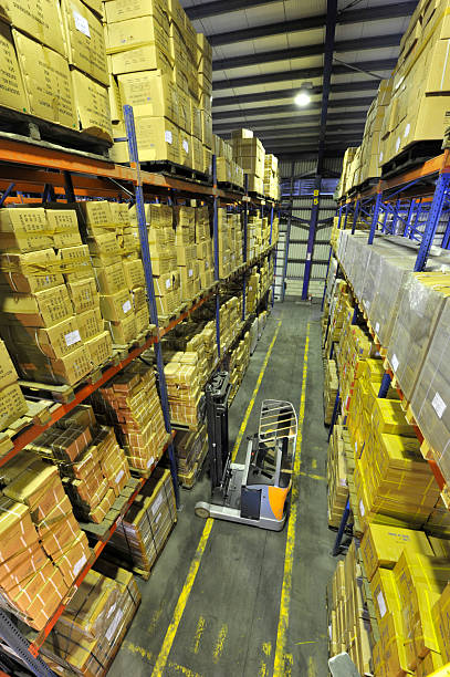 istock Shelves with boxes in factory warehouse 2225224324