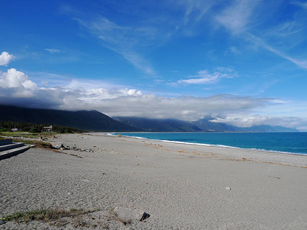 istock Expansive Qixingtan Beach with Mountains and Ocean 2225232006