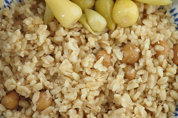 istock rice with chickpeas and pickled yellow peppers 2225232786