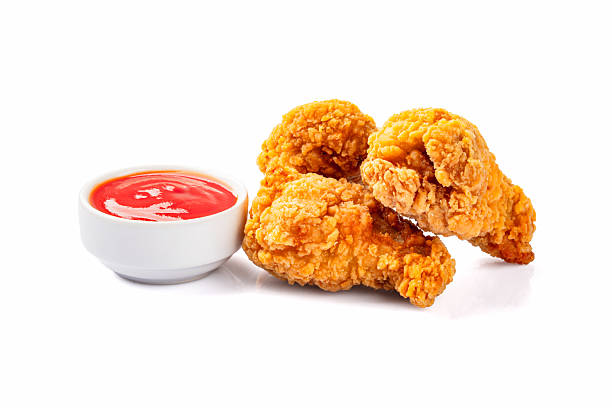 istock Delicious and crispy fried chicken legs on white background 2225234543