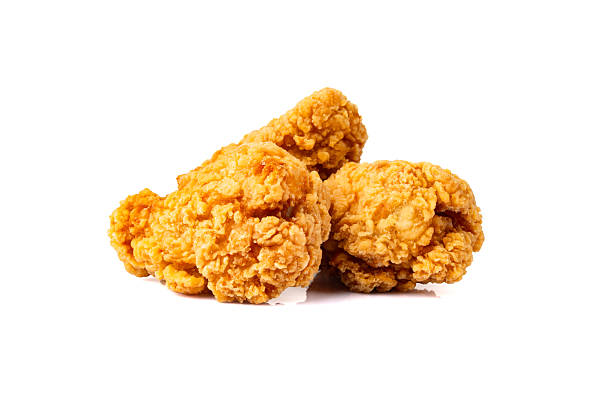 istock Delicious and crispy fried chicken legs on white background 2225234547