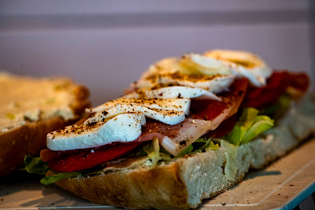 Bread with prosciuto and tomato salad