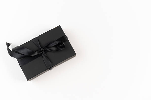 istock Black box with a black ribbon on a white background. Gift box, Elegant gift box with a black ribbon 2225241252