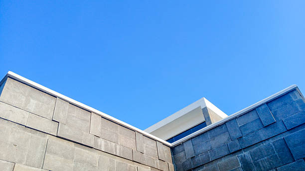 istock Modern building with blue sky background. Background for project or quotes. 2225241900