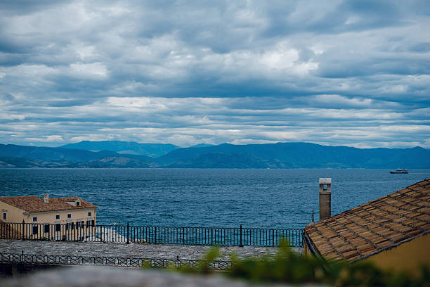 istock Scenic Sea View with Mountains and Cloudy Sky 2225242086