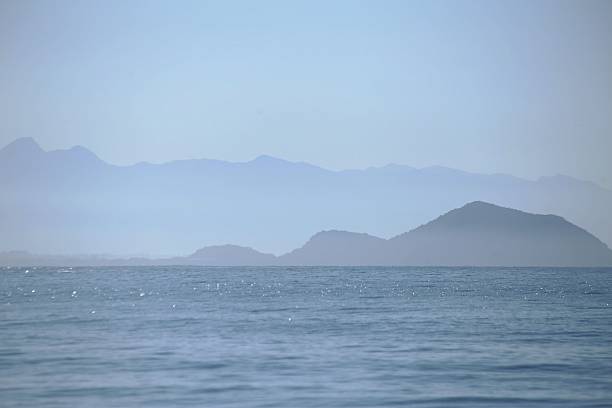 istock Only blue seascape with waters, mountains and sky 2225246092