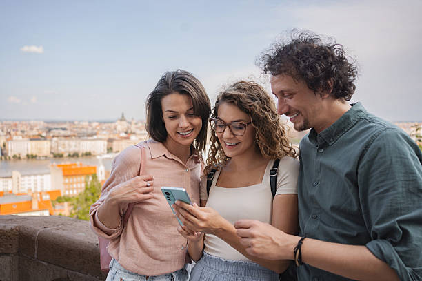 istock Tourists using smartphone and enjoying panoramic view of Budapest, Hungary 2225250552