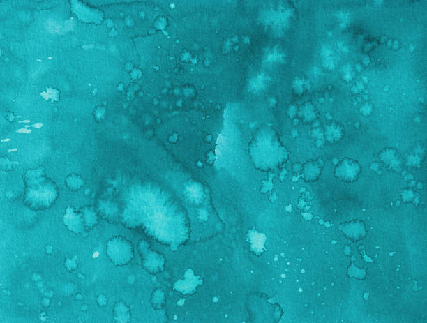Hand painted watercolor background with shades of turquoise blue and splatters