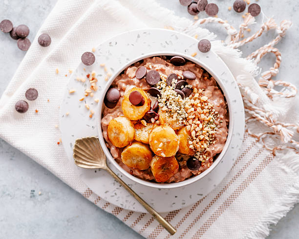 istock Chocolate oatmeal with fried banana 2225259586