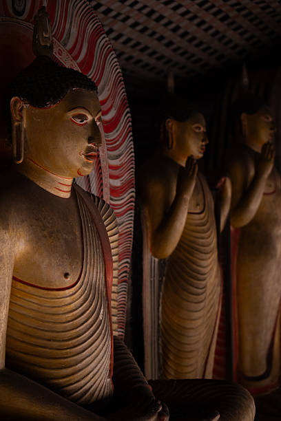 istock Buddha statues meditating inside dambulla cave temple in sri lanka 2225265888