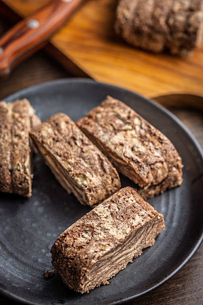 istock Halva with cocoa. Sweet oriental dessert on plate. 2225265950