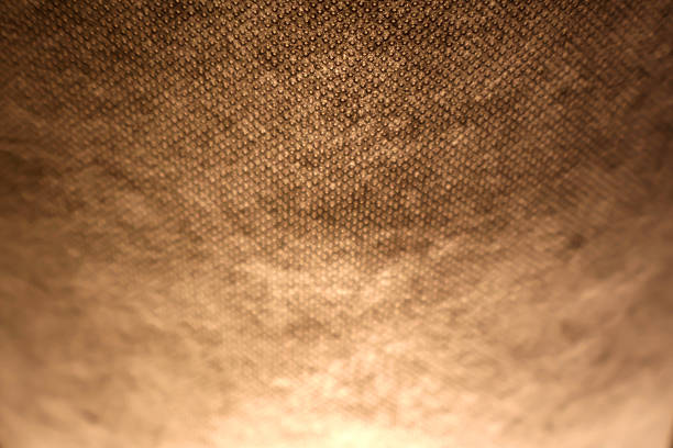 istock Intriguing close-up view of a textured surface with warm lighting 2225268707