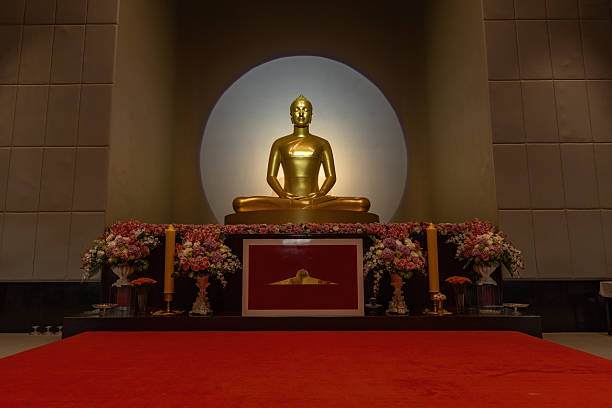 Golden Buddha statue inside the Wat Phra Dhammakaya, Khlong Luang Thailand
