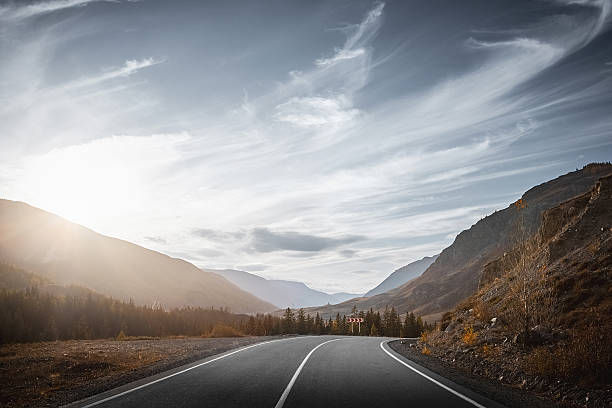 istock autumn mountain road at sunset 2225271728