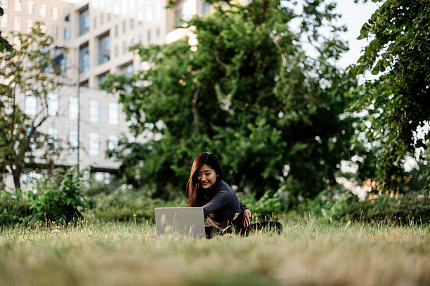 istock Online yoga class at park 2225272025