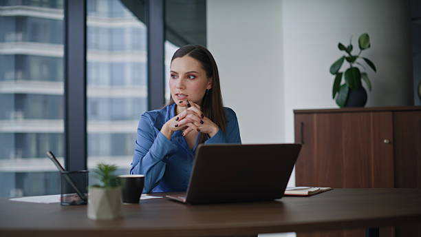 istock Specialist explaining project online conference gesturing to laptop closeup. 2225281092