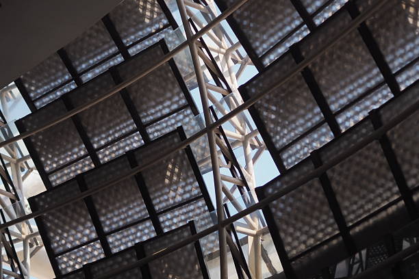 istock close-up, upward-angled view of what appears to be a large, modular structure, possibly a ceiling, roof, or part of an installation. 2225284315