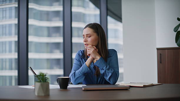 istock Depressed employee dissatisfied problem sitting office closeup. Desperate woman 2225287010