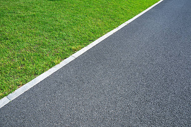 Green area and asphalt footpath