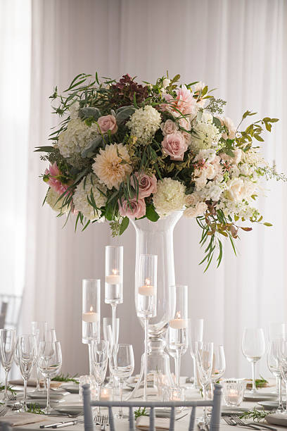 istock Tall Floral Centerpiece with Candles at Elegant Wedding Table 2225291168