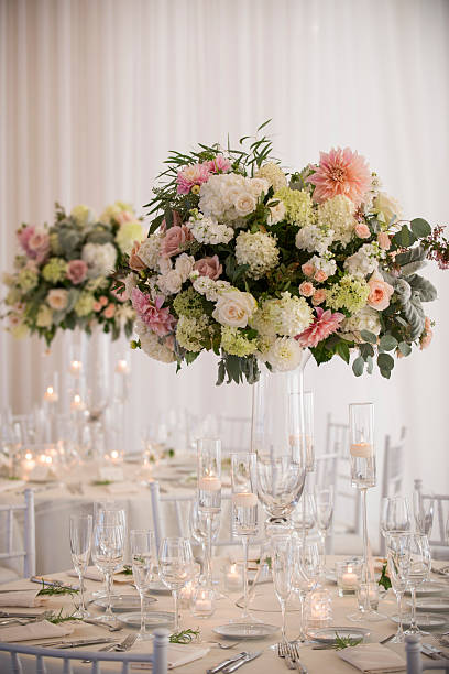 istock Elegant Tall Floral Centerpieces at Formal Wedding Reception 2225291170