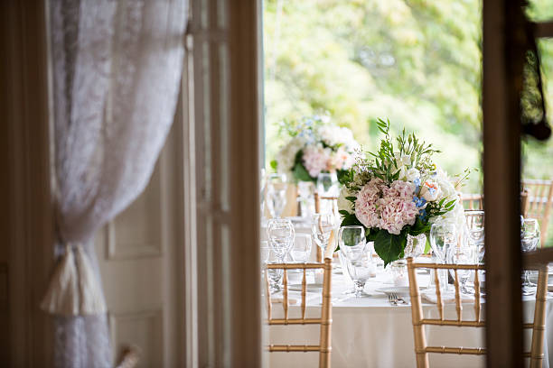 istock Elegant Wedding Table Setting with Pastel Floral Centerpieces 2225291381