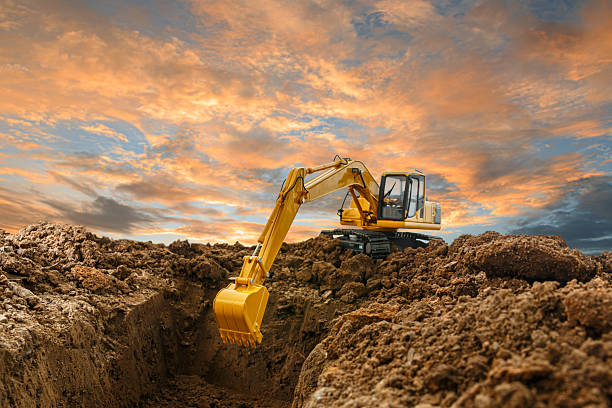 istock Selective focus ,Excavator with Bucket  are digging canalize the soil. 2225296360